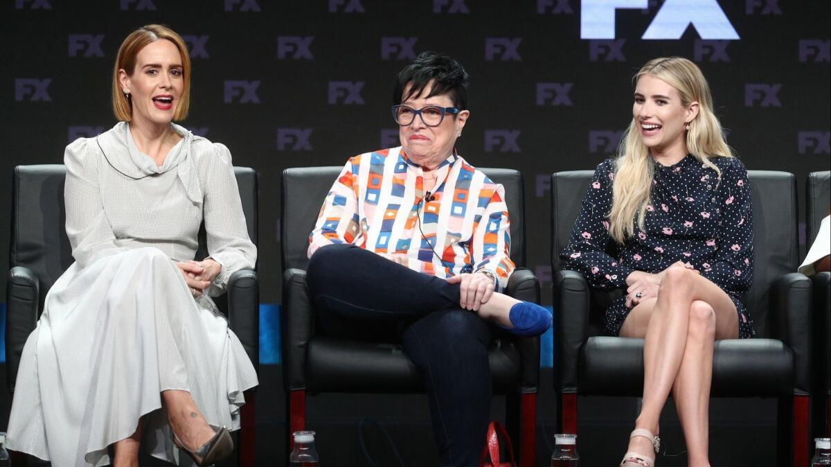 Sarah Paulson, from left, Kathy Bates, and Emma Roberts speak onstage at the 'American Horror Story: Apocalypse' panel during the FX Network portion of the Summer 2018 TCA Press Tour