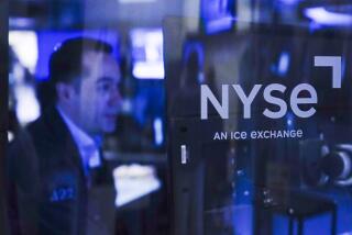Traders work on the floor at the New York Stock Exchange in New York, Tuesday, Oct. 4, 2022. (AP Photo/Seth Wenig)