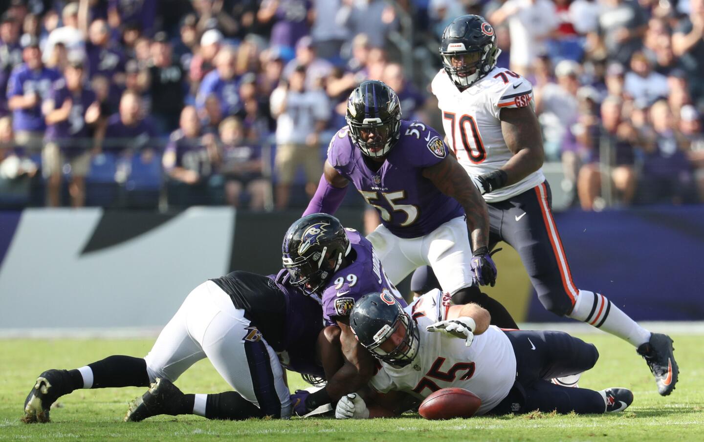 Chicago Bears offensive guard Kyle Long (75) can't recover a fumble by Mitch Trubisky in the fourth quarter on Oct. 15, 2017 at M&T Bank Stadium in Baltimore. The Bears defeated the Ravens, 27-24 in overtime.