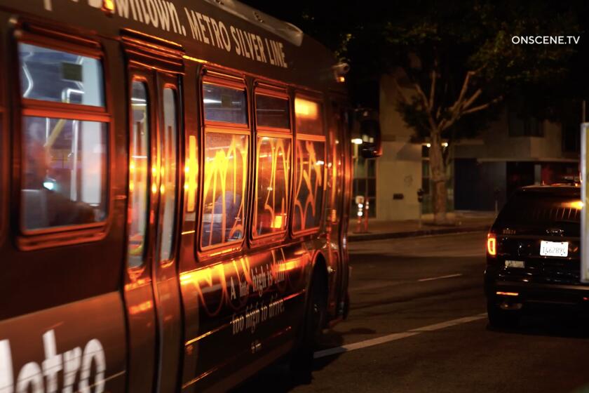 A Metro bus full of passengers was attacked and tagged during a street takeover around 3:15 a.m. near West Olympic Boulevard and Flower Street in downtown Los Angeles early Monday morning, July 1, 2024.
