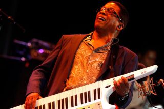 Herbie Hancock wields a wicked keytar at his 70th birthday concert titled "Seven Decades -- The Birthday Celebration" at the Hollywood Bowl on Wednesday, Sept. 1, 2010.