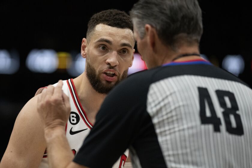 Chicago Bulls guard Zach LaVine, left, disputes a penalty called against him during the first half of an NBA basketball game against the Portland Trail Blazers, Saturday, Feb. 4, 2023, in Chicago. (AP Photo/Erin Hooley)
