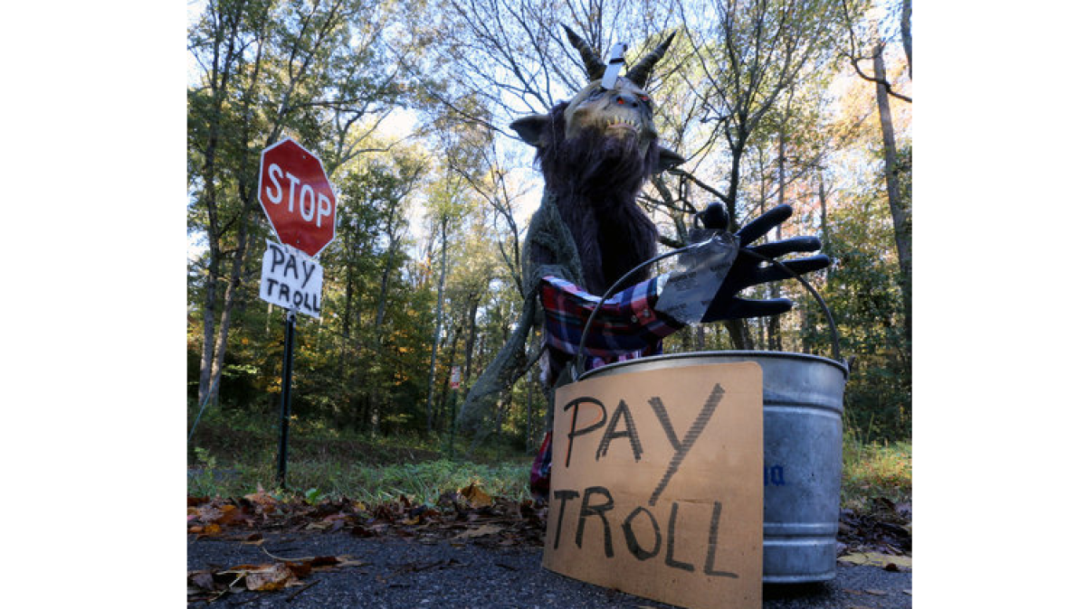This Oct. 30 photo shows a "troll collector" in eastern Henrico County, Va. Readers of The Times and other news sites online are more familiar with another kind of troll, the one that picks verbal fights by posting disruptive or abusive comments.