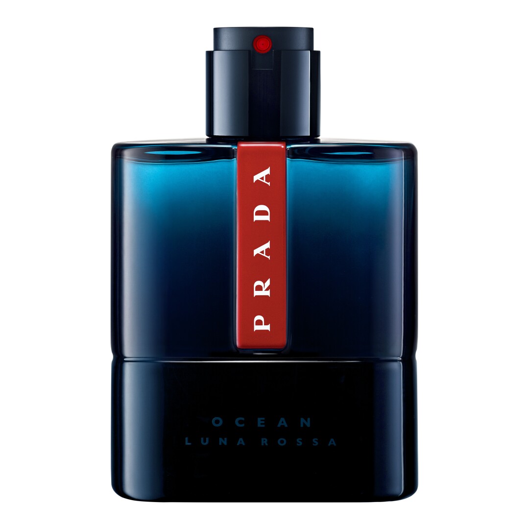 Flacon de parfum bleu foncé avec une étiquette Prada rouge