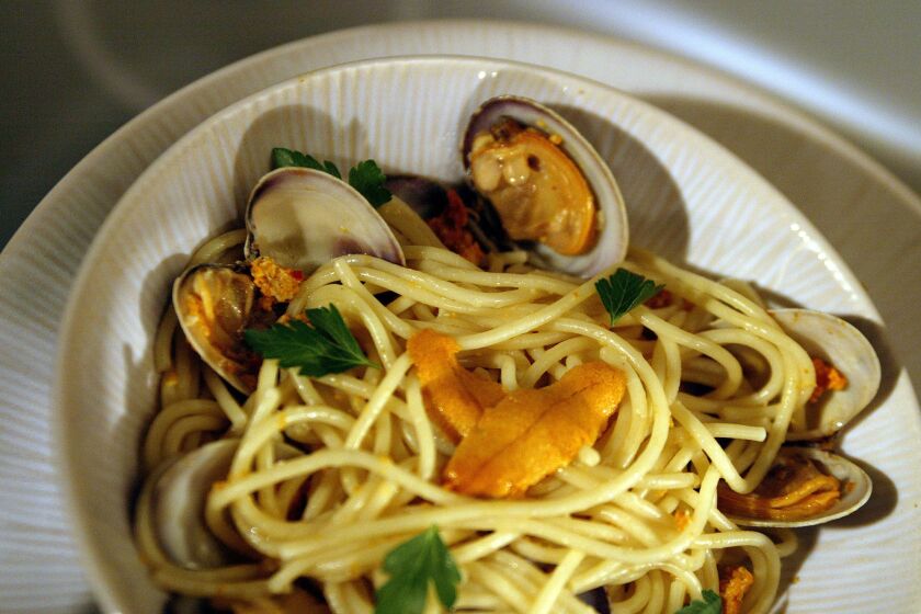 Spaghetti with sea urchin and clams.