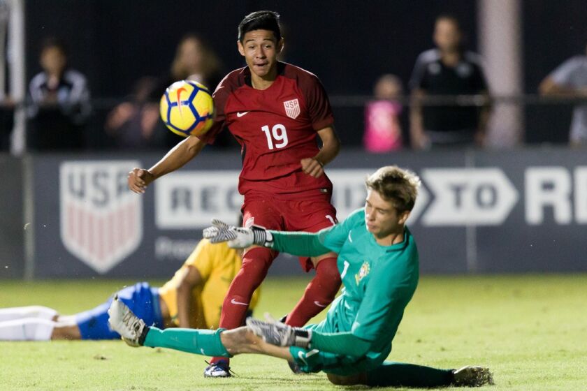 Diego Lopez, top, tries to score during a recent U.S. U-17 national team game.