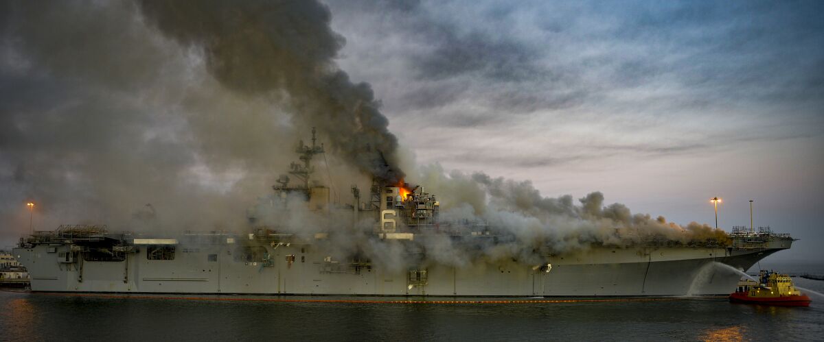 A fire burns on board the amphibious assault ship USS Bonhomme Richard 