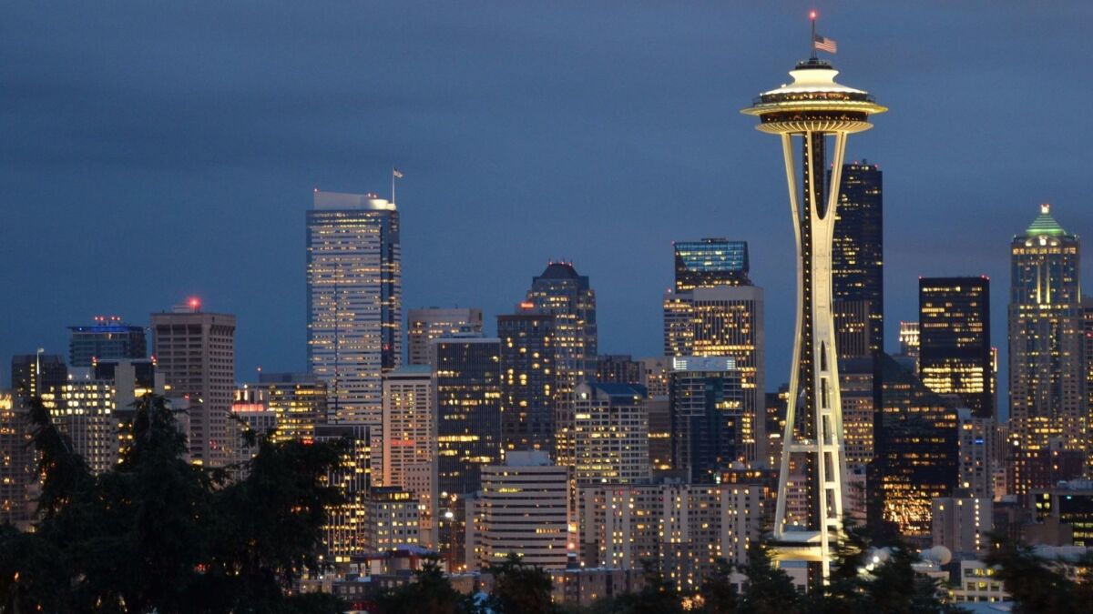 Seattle's Space Needle is centerpiece to the skyline view from Kerry Park on Queen Anne Hill. Seattle will be a popular place to go for Memorial Day weekend. (Christopher Reynolds /Los Angeles Times)