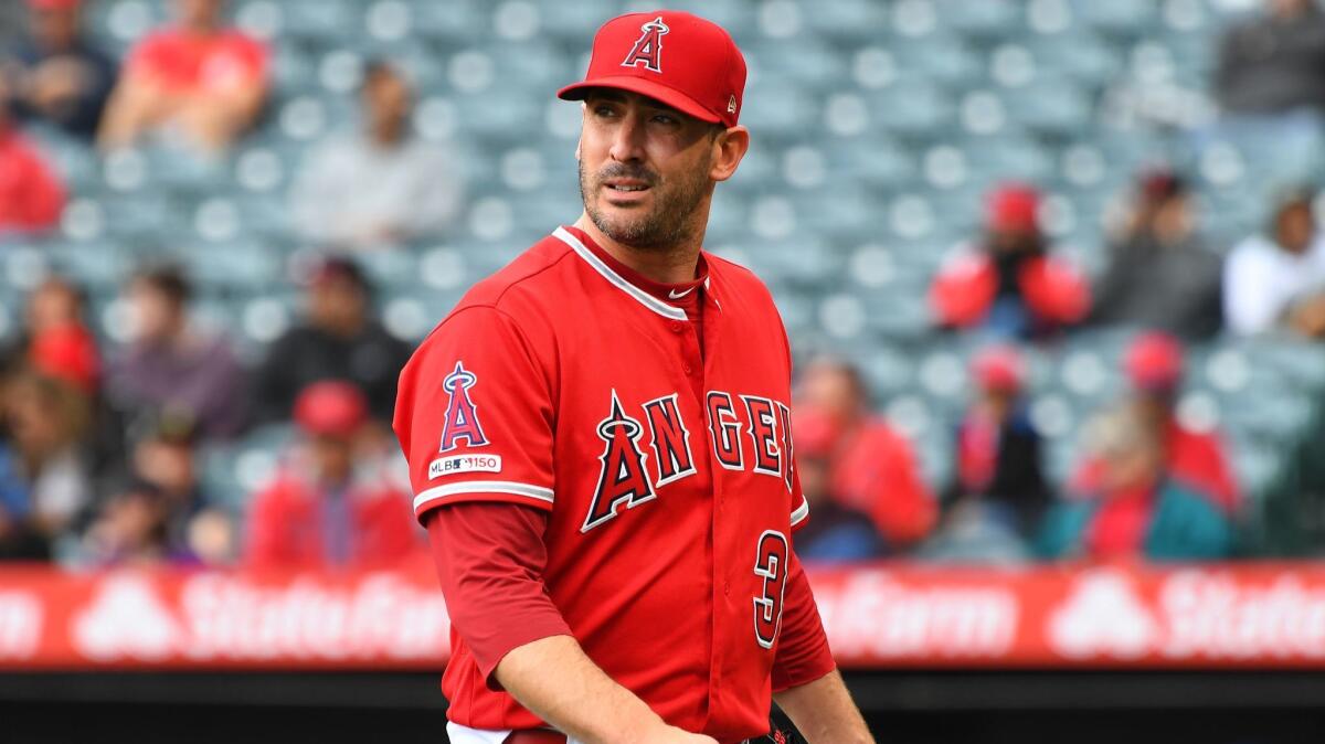 Angels starter Matt Harvey walks to the dugout after giving up six runs in the first inning to the Minnesota Twins on May 23.