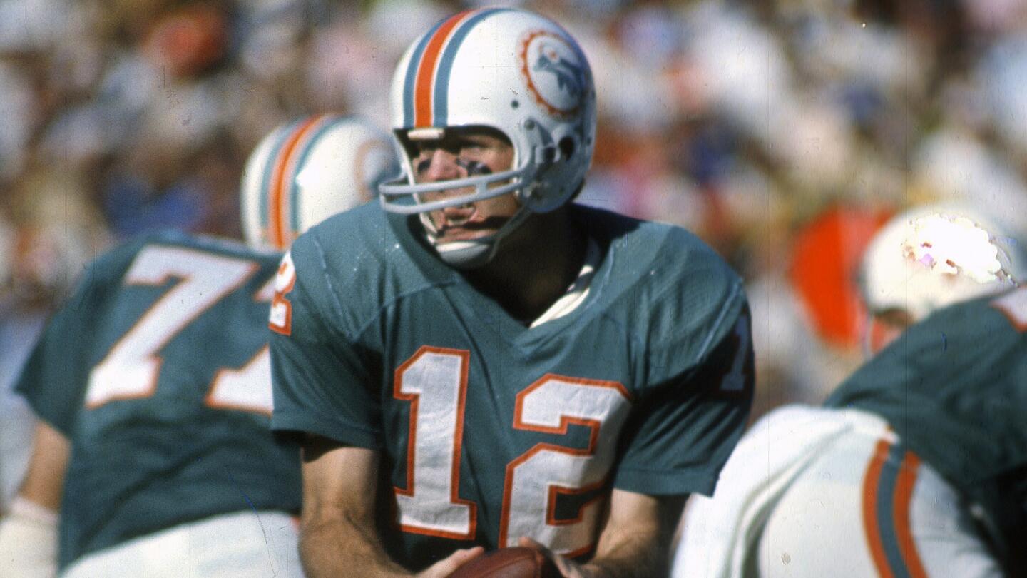 Miami Dolphins quarterback Bob Griese turns to hand off the ball against the Dallas Cowboys in Super Bowl VI on Jan. 16, 1972. Griese led the Dolphins to victory in Super Bowls VII and VIII.