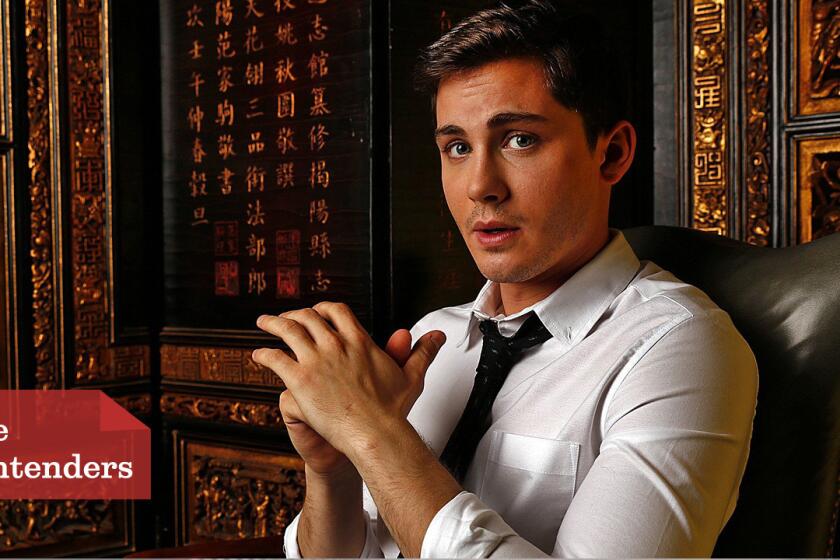 Logan Lerman's role in the World War II action movie "Fury" involved punching costar Brad Pitt in the face.
