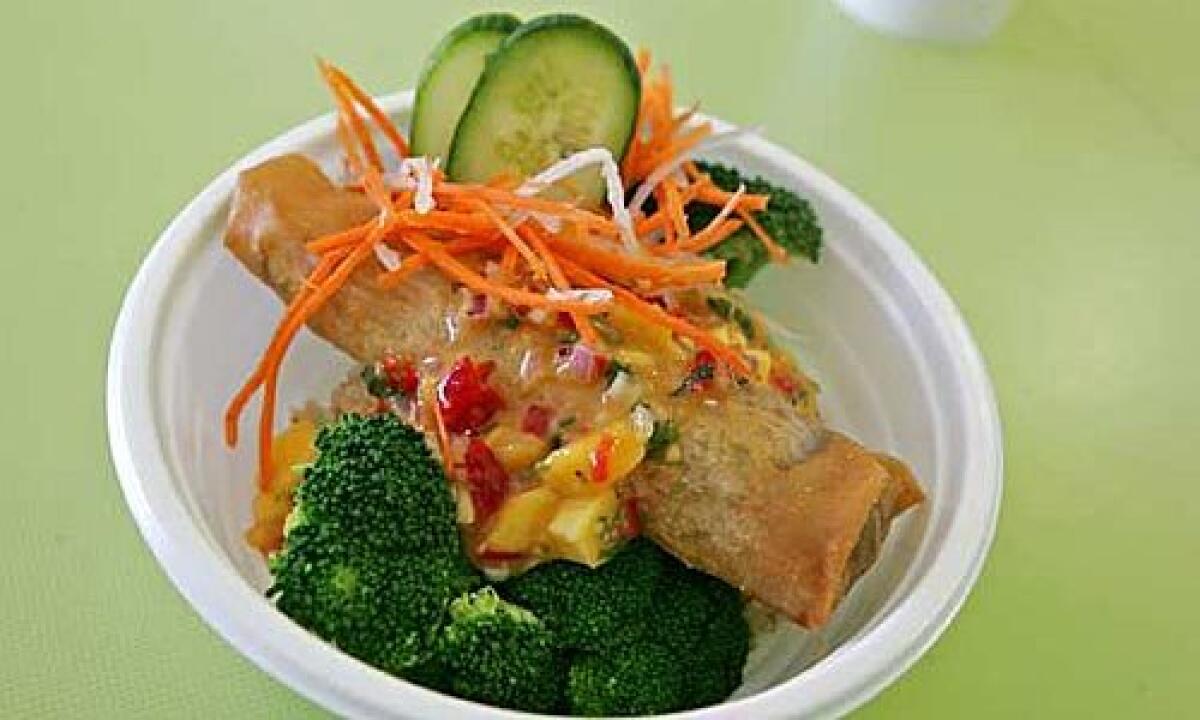 NEW: Seed Kitchens Mango Tango, top, with a vegetable-seitan egg roll.