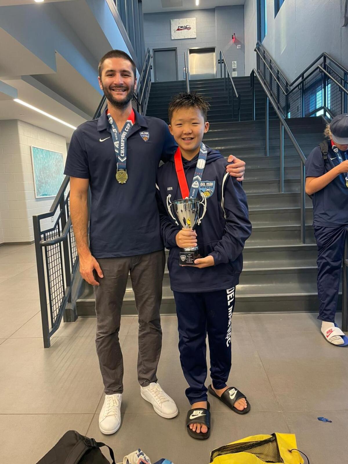 Jody Campbell Sportsmanship Award recipient Aden Shin with Coach Marko Vukojevic.