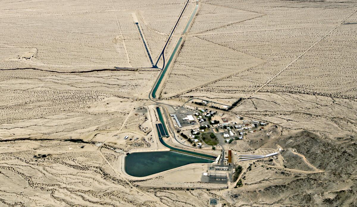 A water pumping station in the middle of the desert.