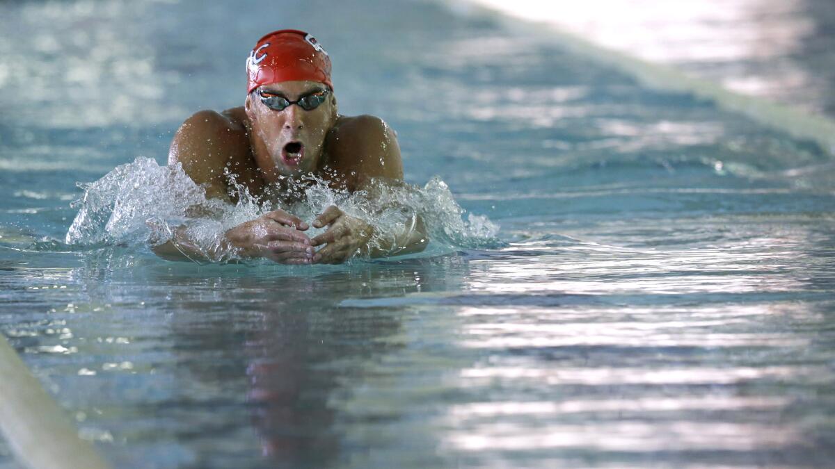 Michael Phelps trains at the Meadowbrook Aquatic and Fitness Center in Baltimore on Thursday. Phelps, the most decorated athlete in Olympic history, will compete in four events at this week's USA Swimming National Championships in Irvine.