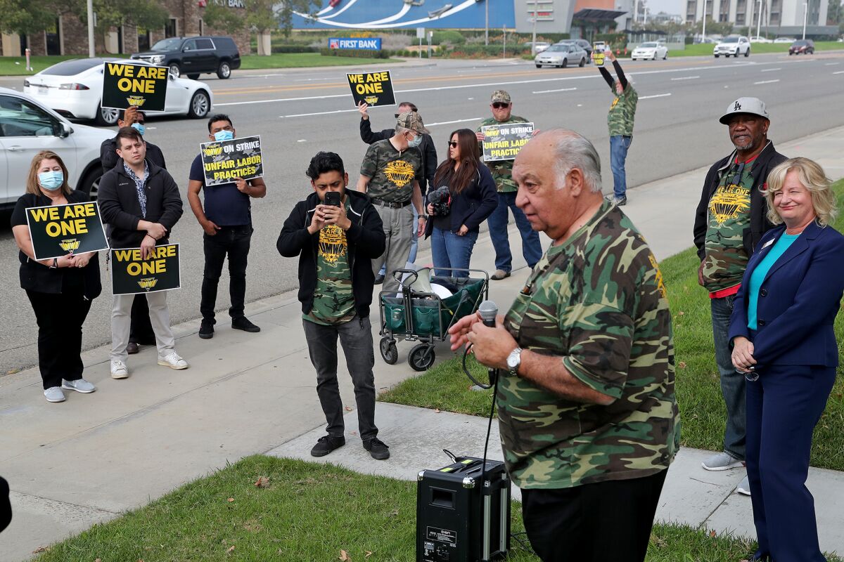 Union members protest against unfair labor practices for Warrior Met Coal workers during a demonstration on Thursday.