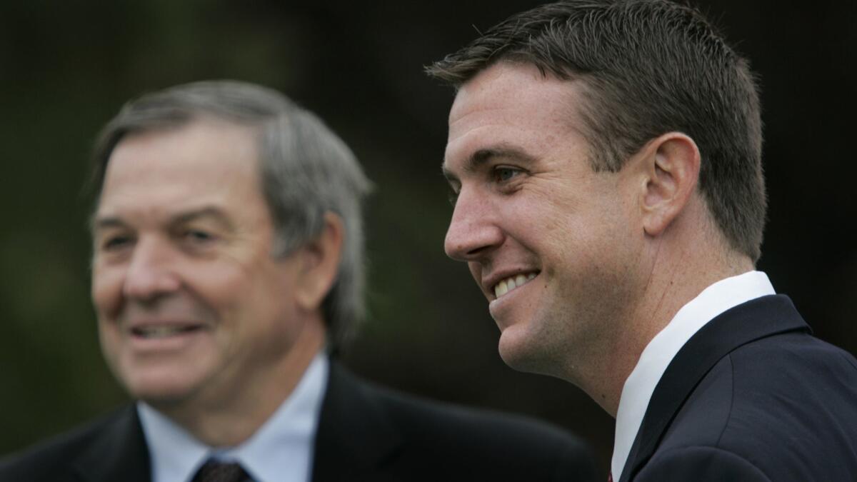 Former Congressman Duncan Hunter (left) and his son, Duncan D. Hunter, were joint guest speakers at the Singing Hills Memorial Park's Memorial Day celebration in 2008 when the junior Duncan Hunter was campaigning for his father's House seat.