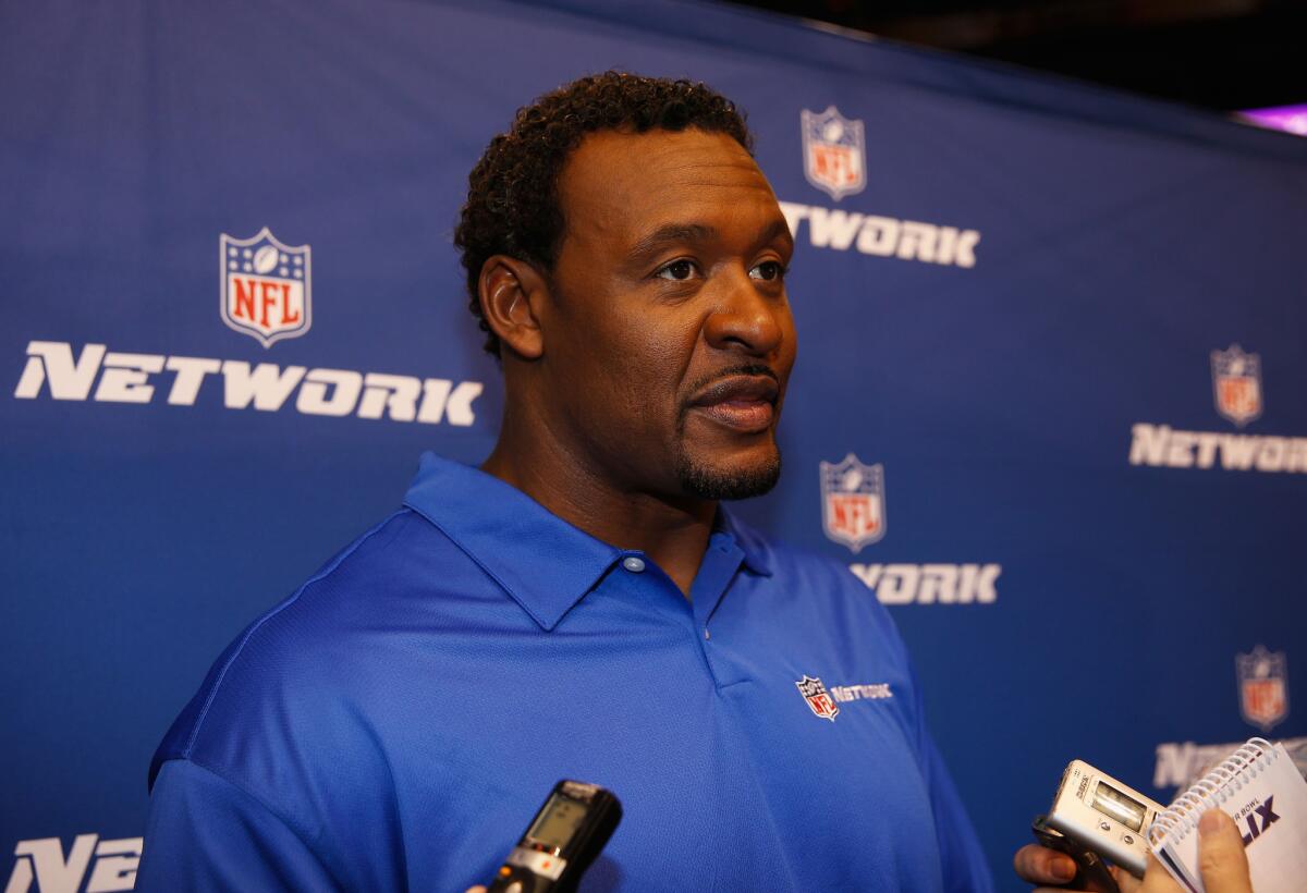 Former USC and NFL linebacker Willie McGinest, an NFL Network analyst, speaks with the media during Super Bowl media day in January.