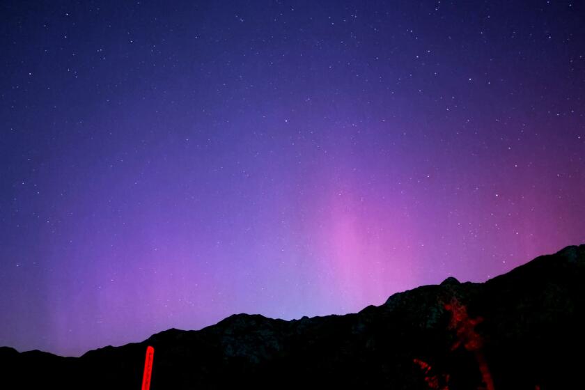 Los Angeles, California-May 10, 2024-Above the clouds and facing north, the lights from the aurora borealis were visible along Highway 2 in Angeles National Forest. (Jaclyn Cosgrove / Los Angeles Times