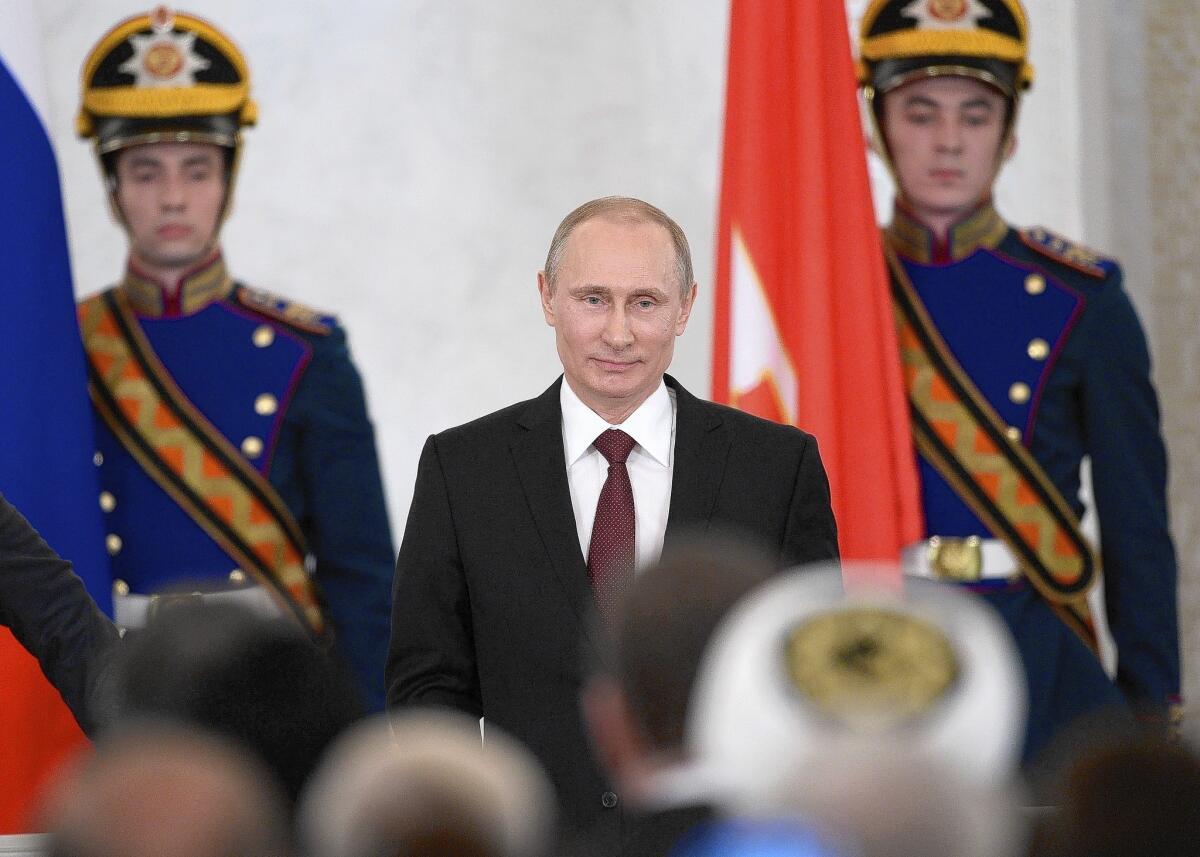 Russian President Vladimir Putin, pictured addressing a joint session of the Russian parliament this month, has quashed political opposition and independent media, leaving virtually no one to challenge his decisions.