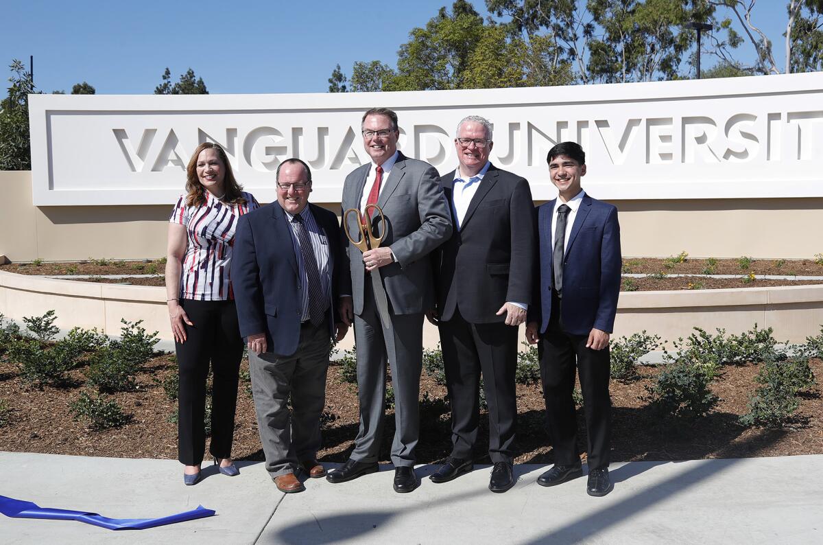 Vanguard University and Costa Mesa officials in a ceremony Friday celebrated a new sign at Newport Boulevard and Fair Drive