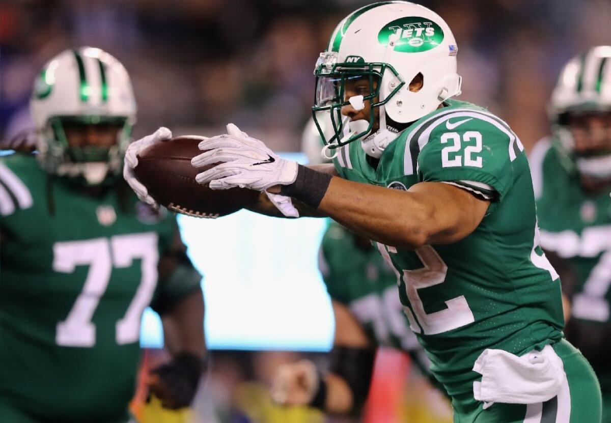 Jets running back Matt Forte scores a touchdown against the Bills during a game on Thursday Night Football.