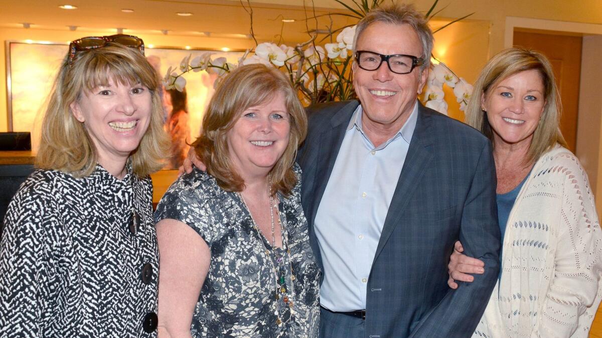 Tom Whalen of Hotel Amarano, welcomed Susan Sebastian, from left, Karen Volpei-Gussow and Chris Hunter to the inaugural Ladies Shopping Night to benefit the local Boys & Girls Club.