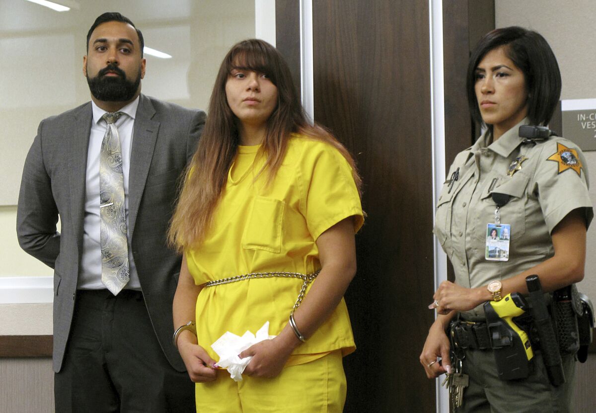 Obdulia Sanchez appears in Merced County Superior Court with her public defender, Ramnik Samrao, left, in 2017.