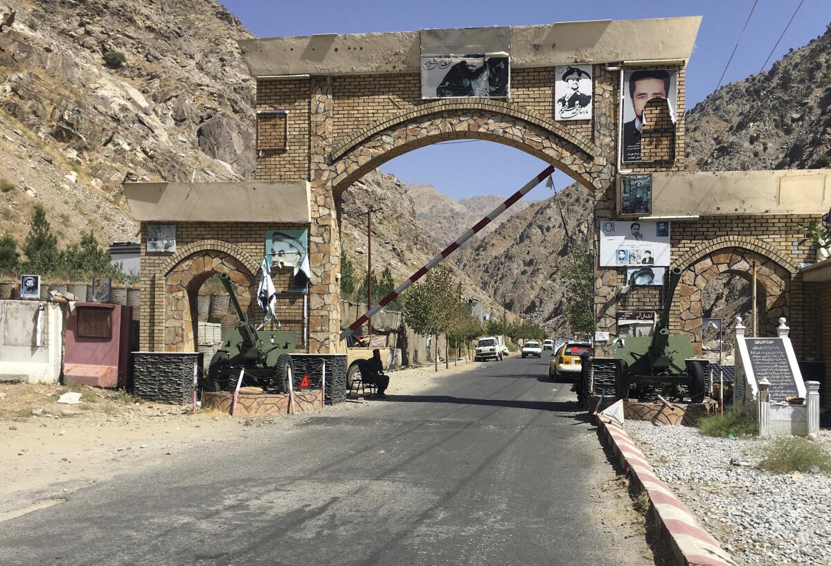 A Taliban soldier guards the Panjshir gate in Panjshir province northeastern of Afghanistan, Wednesday, Sept. 8, 2021. (AP Photo/Mohammad Asif Khan)