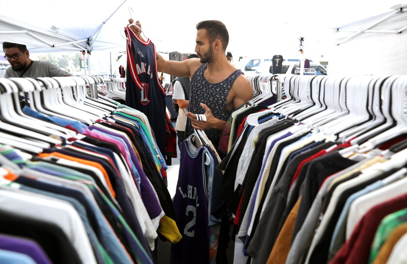 Souren Ohanian looks at T-shirts at the Rose Bowl Flea Market