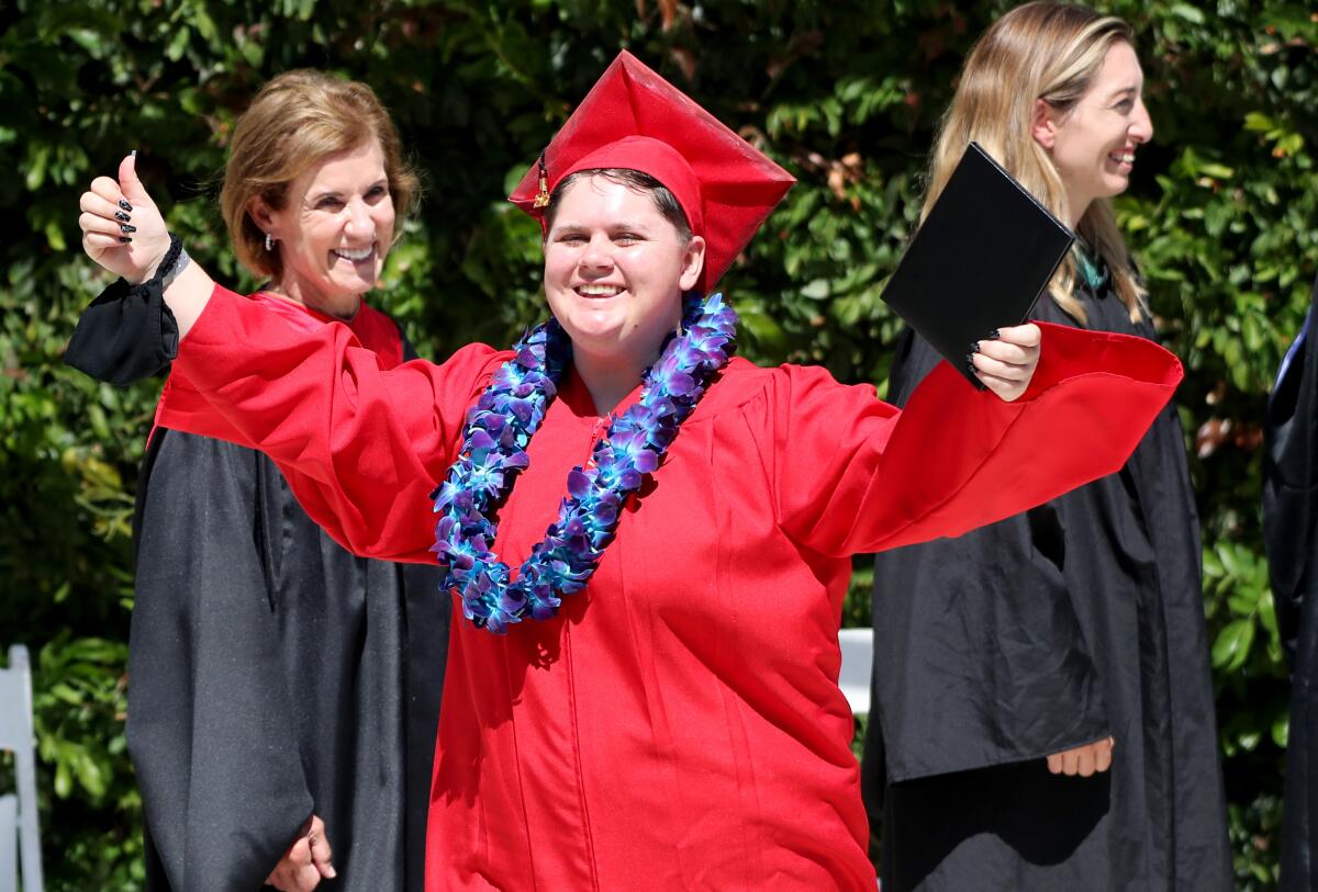 Victoria Ashley celebrates at the Back Bay/Monte Vista High School commencement ceremony on Thursday, June 10, 2021.