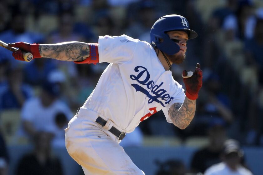 Los Angeles Dodgers' Alex Verdugo bats during the ninth inning of a baseball game against the San Diego Padres Sunday, Aug. 4, 2019, in Los Angeles. (AP Photo/Mark J. Terrill)