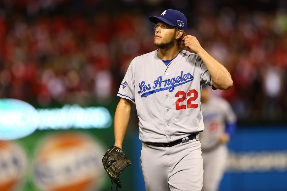 Dodgers pitcher Clayton Kershaw reacts while on the mound in the third inning against the St. Louis Cardinals.
