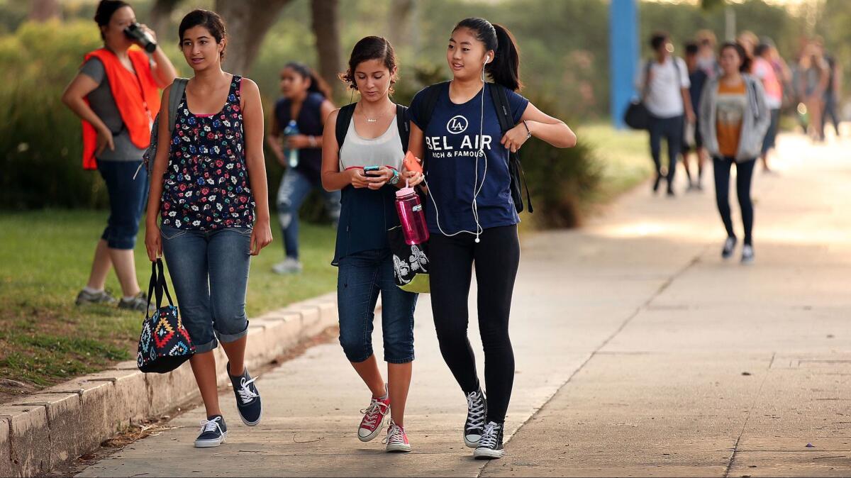 Students arrive in 2015 for classes at the Los Angeles Center for Enriched Studies, a racially diverse magnet school in the Los Angeles Unified School District.