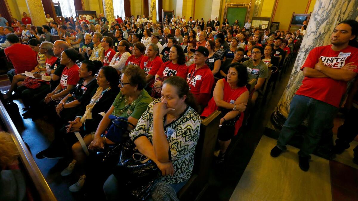 A crowd fills the Los Angeles City Council chambers in June as the Planning Commission considers imposing new regulations on Airbnb and other websites that help Angelenos rent out rooms or entire homes for short stays.