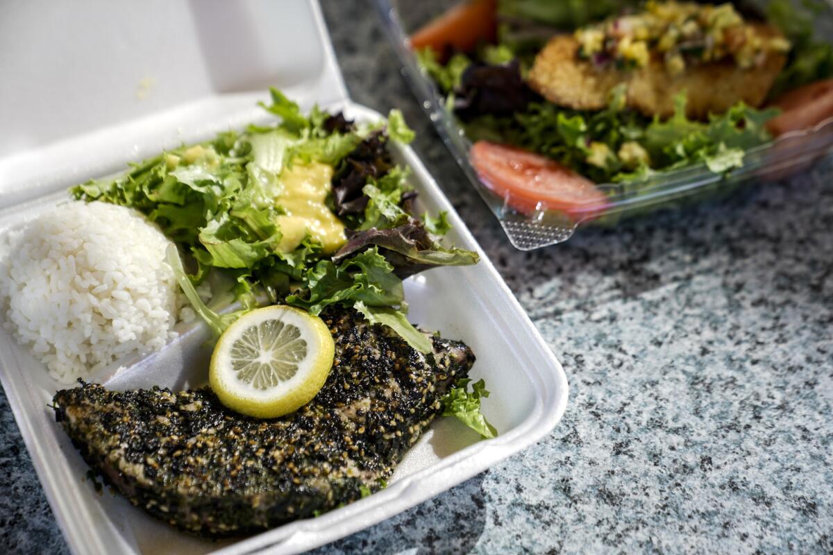 Furikake Pan Seared Ahi with rice and mixed greens, and panko crusted fish salad, photographed at Nico's Pier 38.