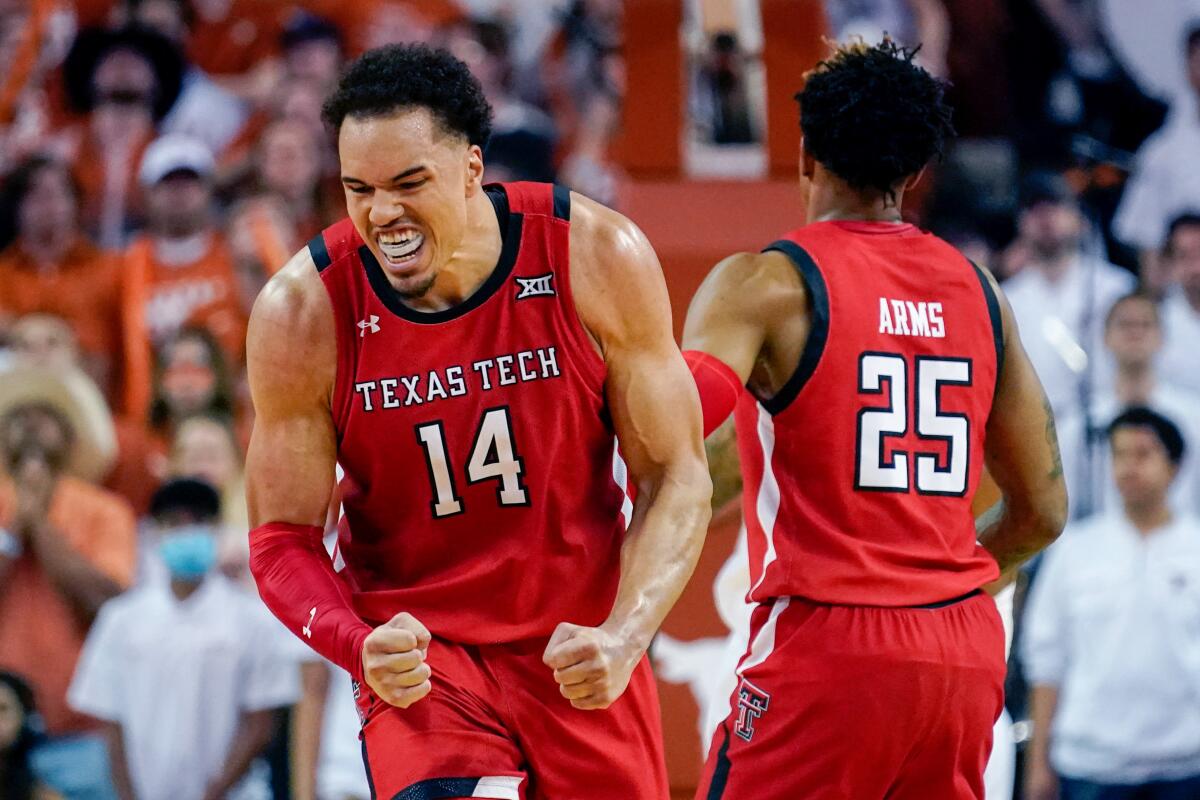 Texas Tech forward Marcus Santos-Silva reacts after a score against Texas.