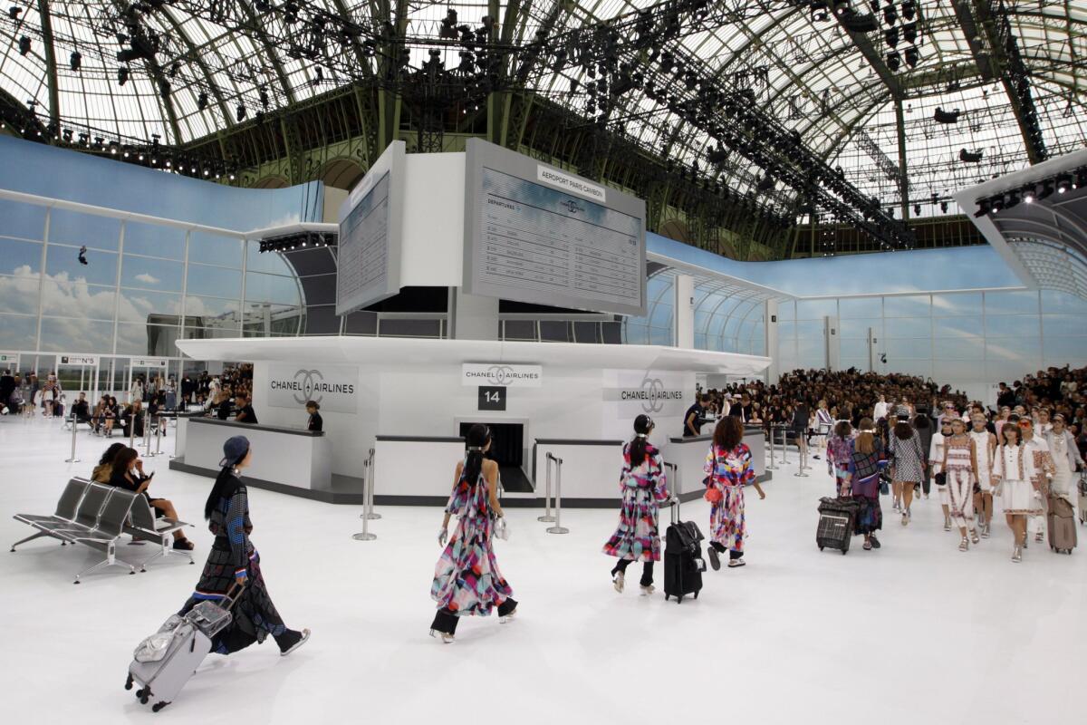 Models wear creations for Chanel's Spring-Summer 2016 ready-to-wear fashion collection presented during the Paris Fashion Week, Tuesday, Oct. 6, 2015 in Paris, France. (AP Photo/Francois Mori)