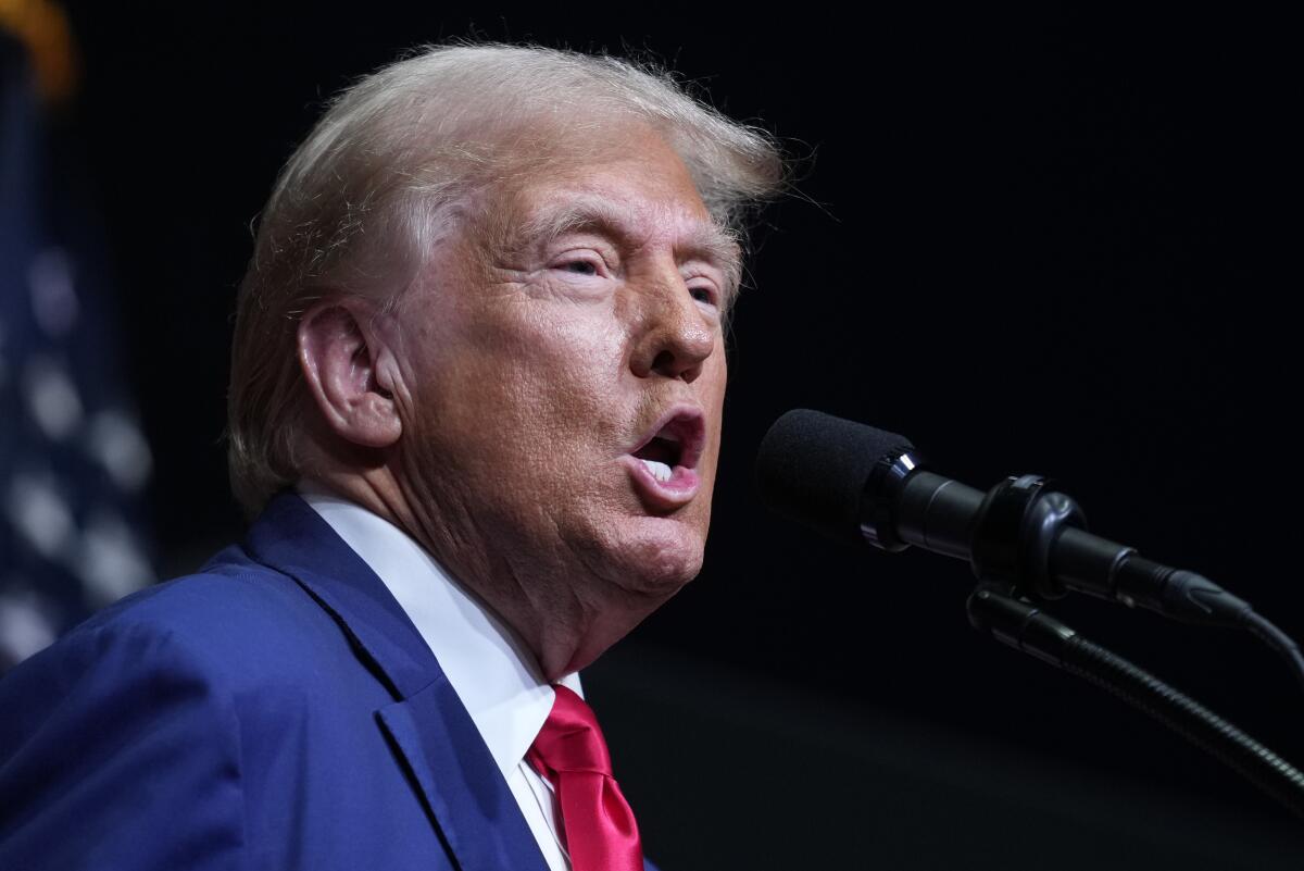 Former President Trump speaks at a campaign rally in Asheville, N.C., on Aug. 14.