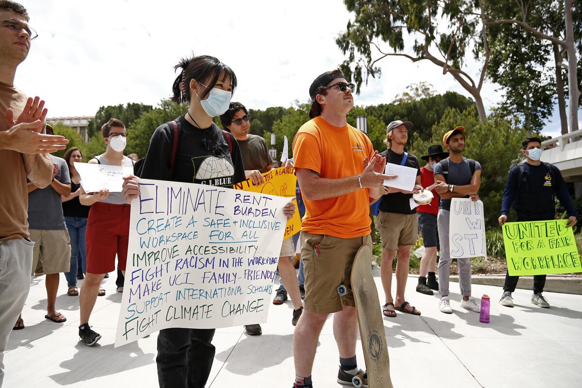 Members of the UC Student Workers Union and Student Researchers United held rallies on UC campuses Tuesday, including UCI