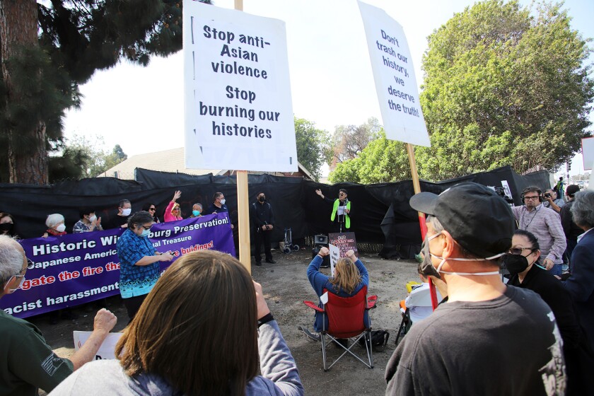 Asian Americans and supporters rallied Saturday at the site of the Historic Wintersburg Japanese Mission that burned down.