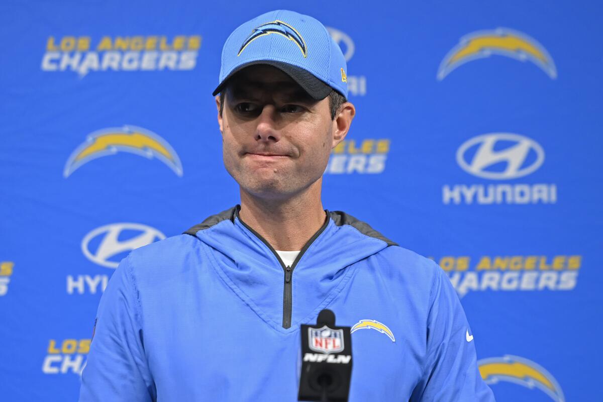 Chargers head coach Brandon Staley grimaces during a news conference