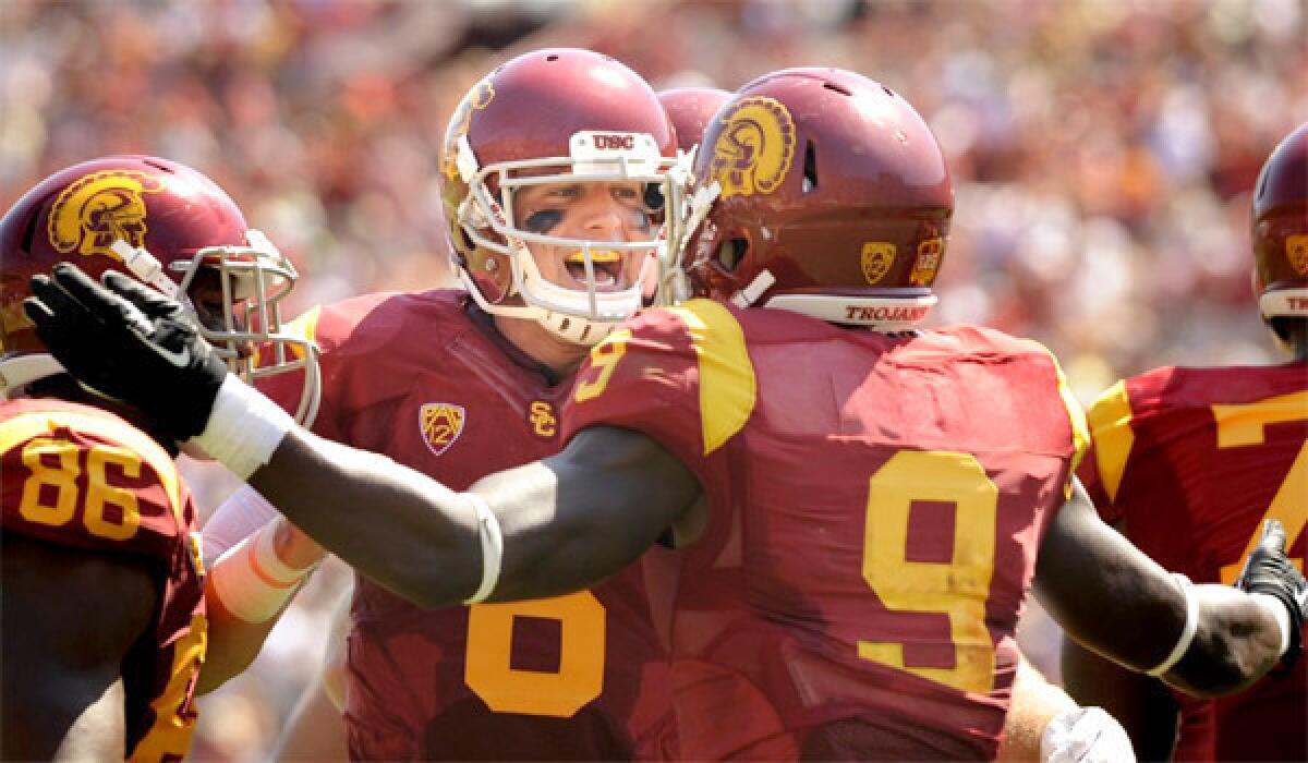 Cody Kessler says he's more settled in to the starting quarterback role after USC's 35-7 victory over Boston College in which he completed 15 of 17 passes for 237 yards and two touchdowns on Saturday.