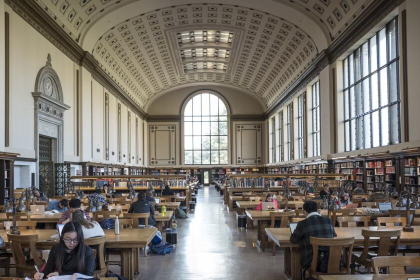 JANUARY 24, 2017 BERKELEY, CALIFORNIA Students read at the main library at the University of California at Berkeley. This is a traditional space in contrast to the recently-renovated Moffitt Library. Updates in various spaces on campus have created new types of study spaces and have eliminated traditional bookshelves. Photo by David Butow/for the Times