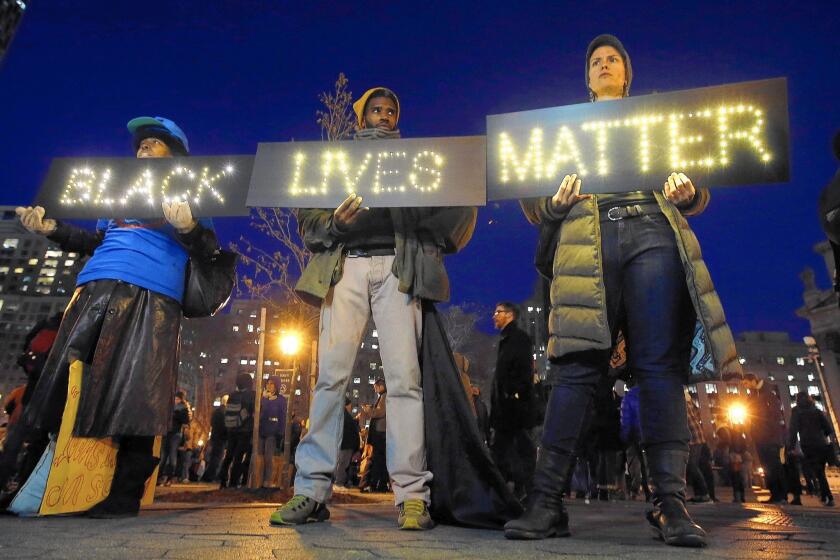 In this December protest in New York's Foley Square and others in cities across America, the phrase "Black Lives Matter" became a rallying cry for demonstrators calling for justice in police shootings of African Americans.