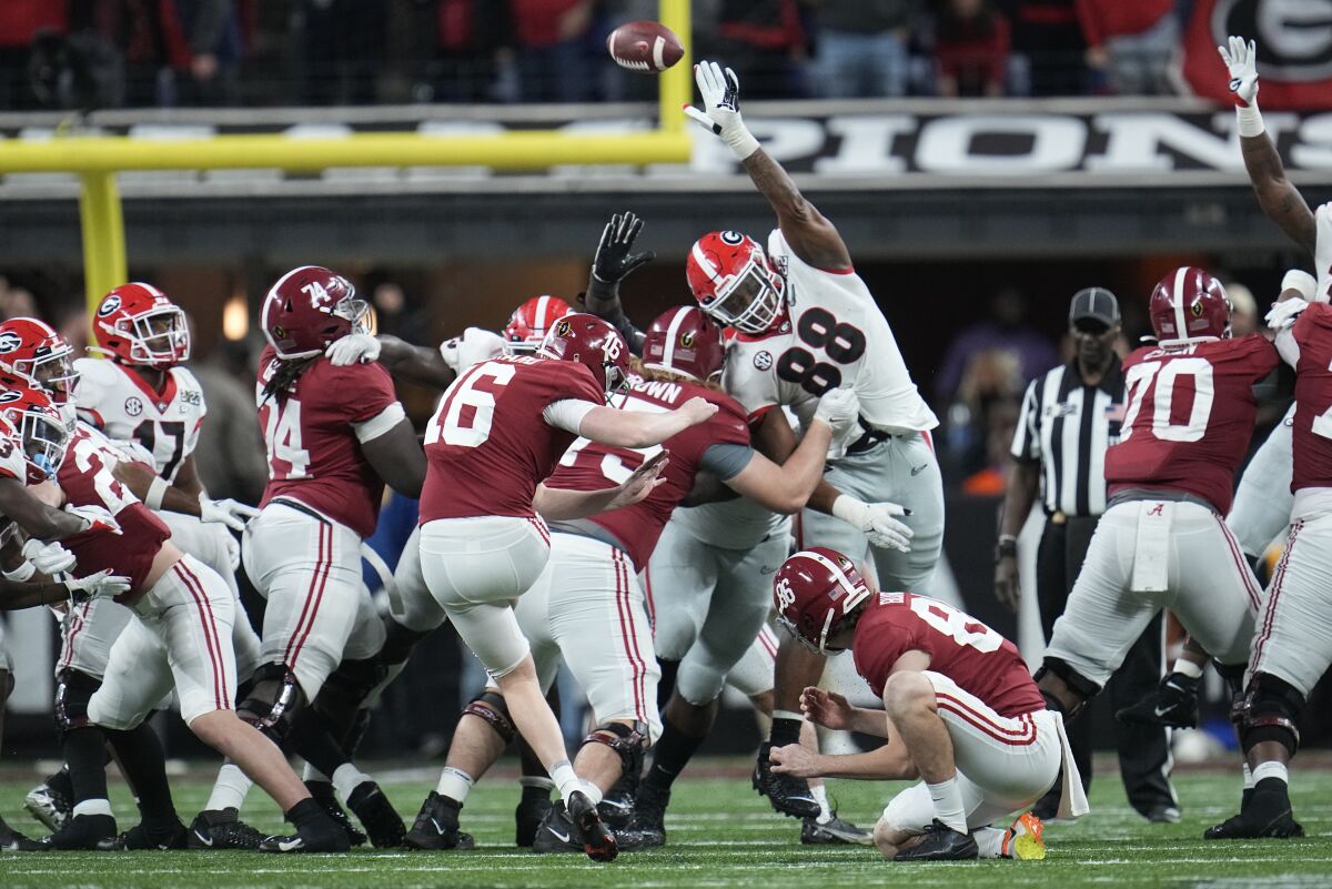 Alabama place kicker Will Reichard has a field goal attempt blocked during the second half of the College Football Playoff championship football game against Georgia Monday, Jan. 10, 2022, in Indianapolis. (AP Photo/Paul Sancya)