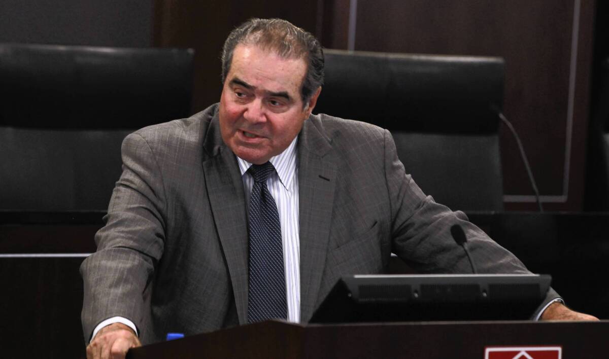 Justice Antonin Scalia defended his writings comparing laws against homosexuality to those prohibiting bestiality and murder, saying he was arguing that many laws are based on society's moral feelings.