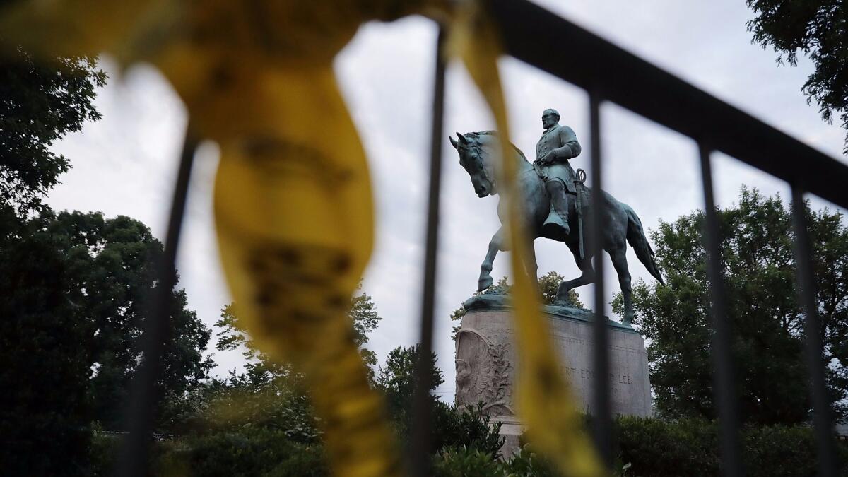 The statue of Confederate Gen. Robert E. Lee stands in Emancipation Park in Charlottesville, Va.