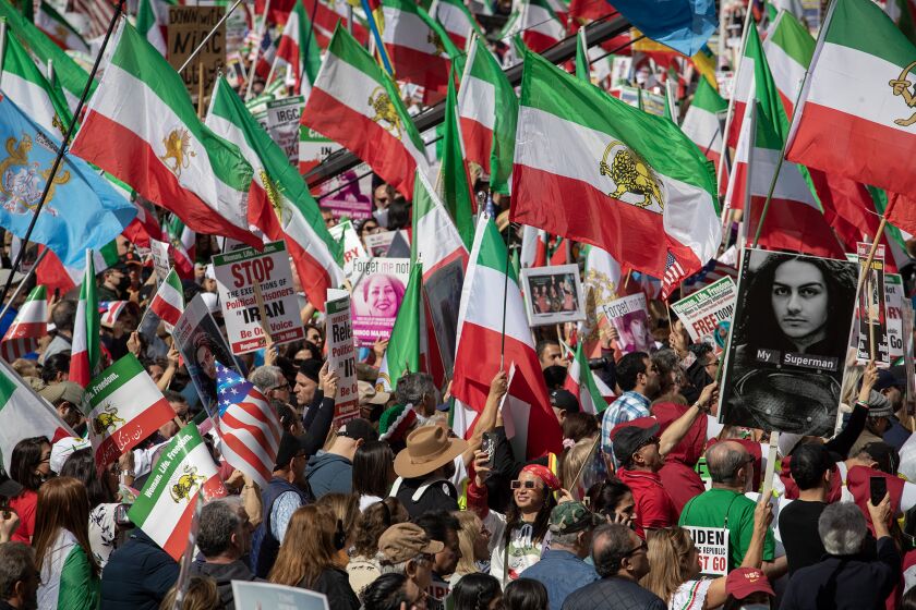 LOS ANGELES, CA - February 11, 2023: Thousands of Iranian community members and human rights advocates gather to protest against the oppressive Islamic regime in Iran during a rally outside Los Angeles City Hall Saturday February 11, 2023 in Los Angeles, CA. (Brian van der Brug / Los Angeles Times)