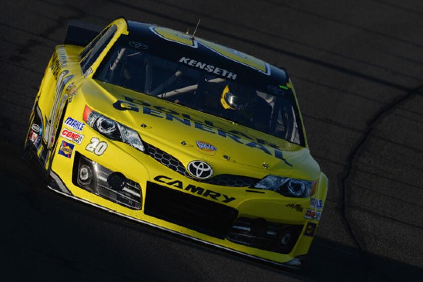 Matt Kenseth competes in qualifying Friday for Sunday's NASCAR Sprint Cup Series race at Auto Club Speedway in Fontana.